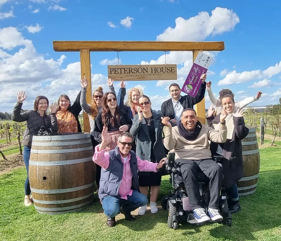 Guests share sparkling wine together at Peterson House