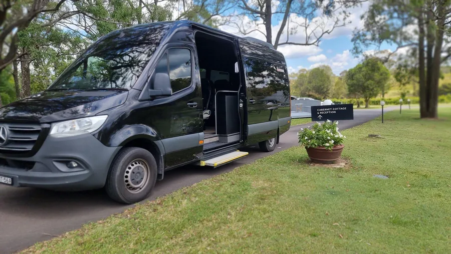 The Sprinter with its sliding door open, ready for boarding
