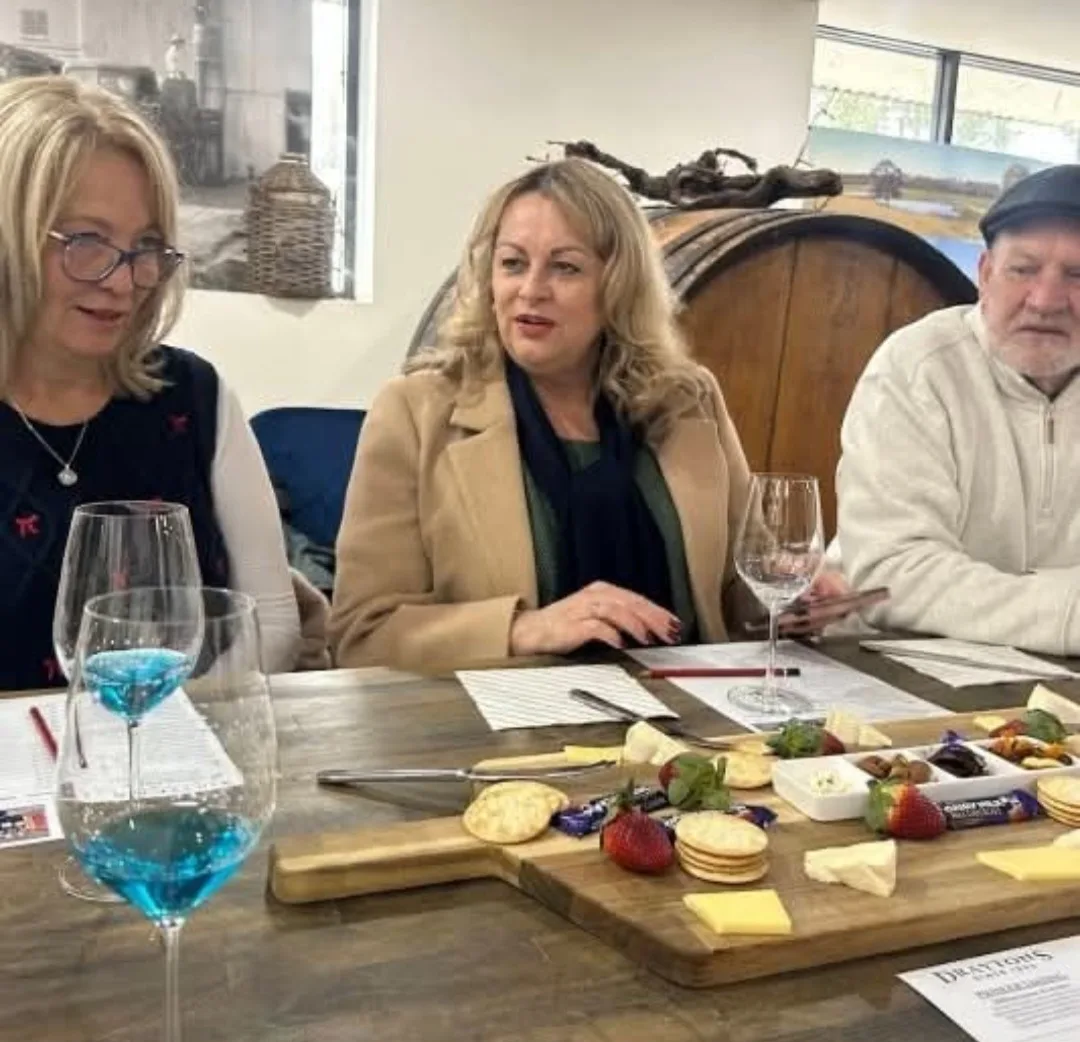 Guests enjoying a wine and cheese tasting on the Full Day Wine, Cheese and Chocolate Tour